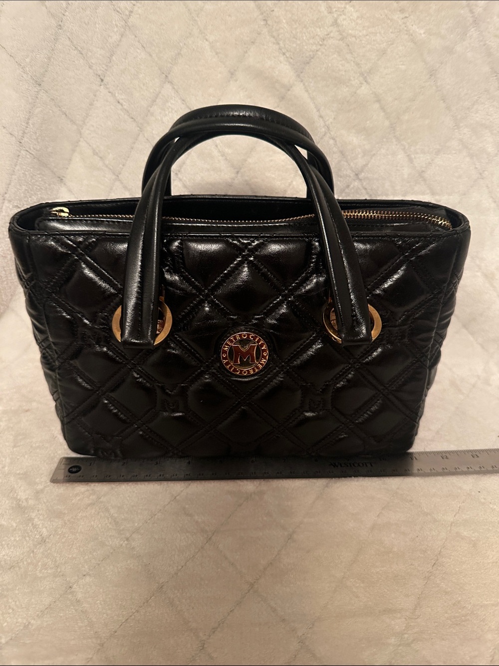 Quilted Black Leather Satchel with Gold-Tone Accents